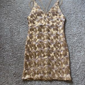 Gold mini dress by Shareen size 12 (runs very small). New with tags
